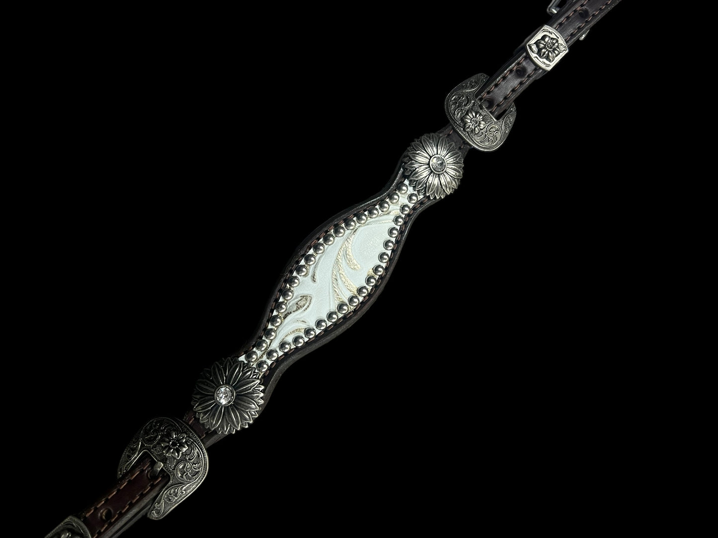 White and silver floral on dark leather