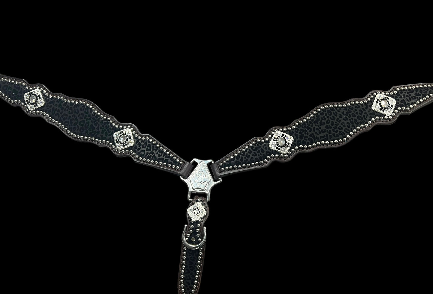 Black flocked leopard on dark leather