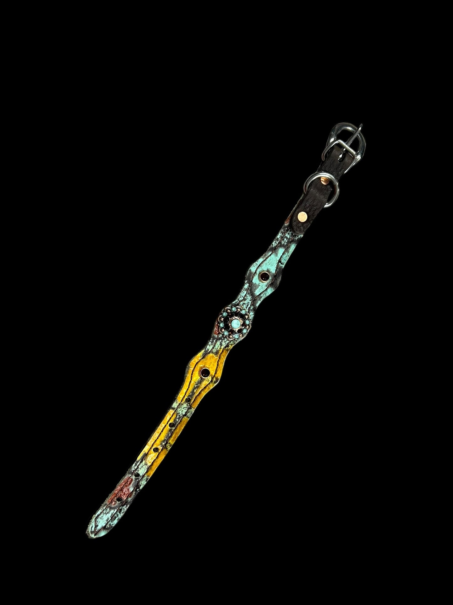 Yellow, mint, and brick red Taos on dark leather