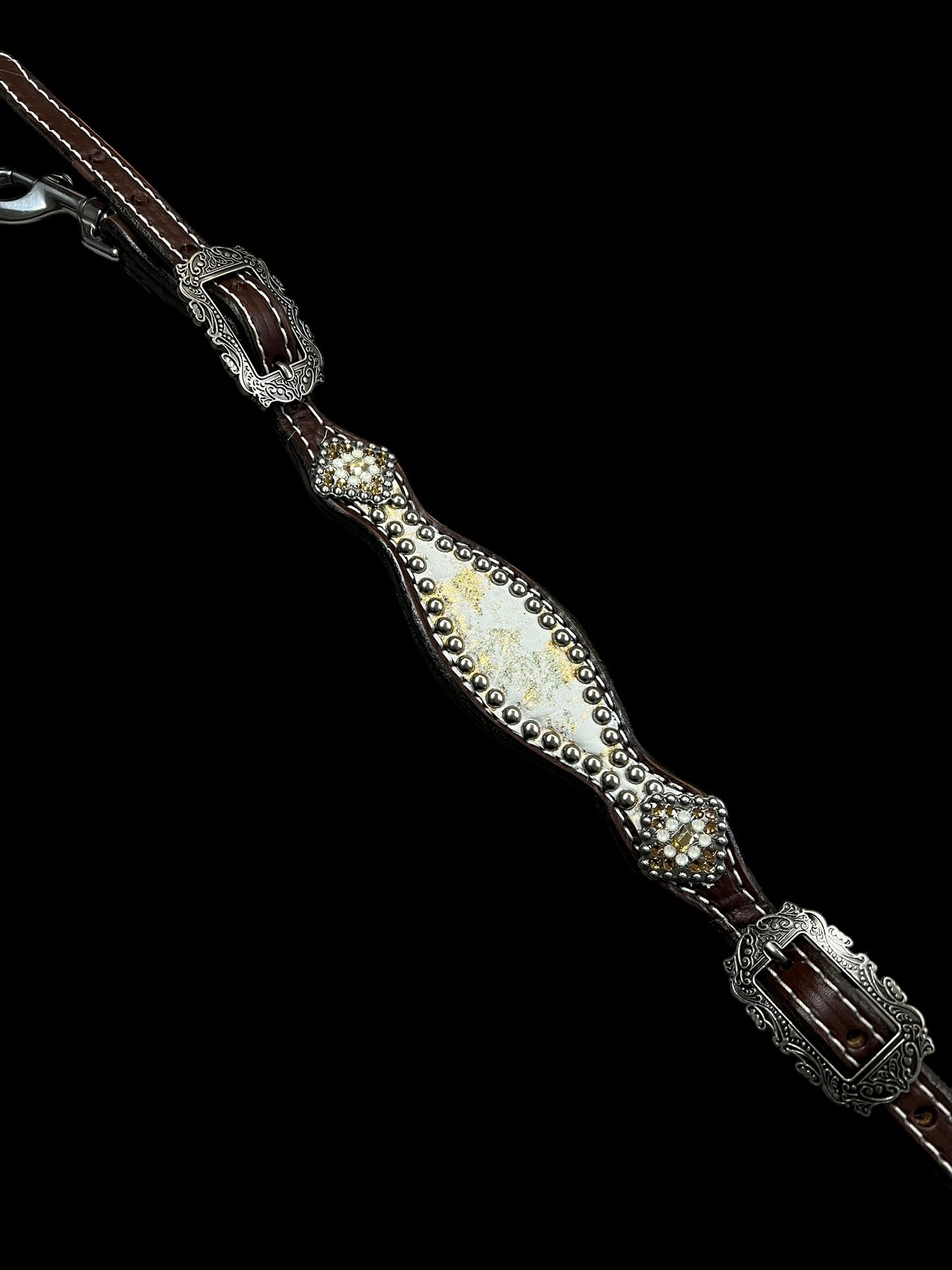 Ivory and gold halo on Walnut leather