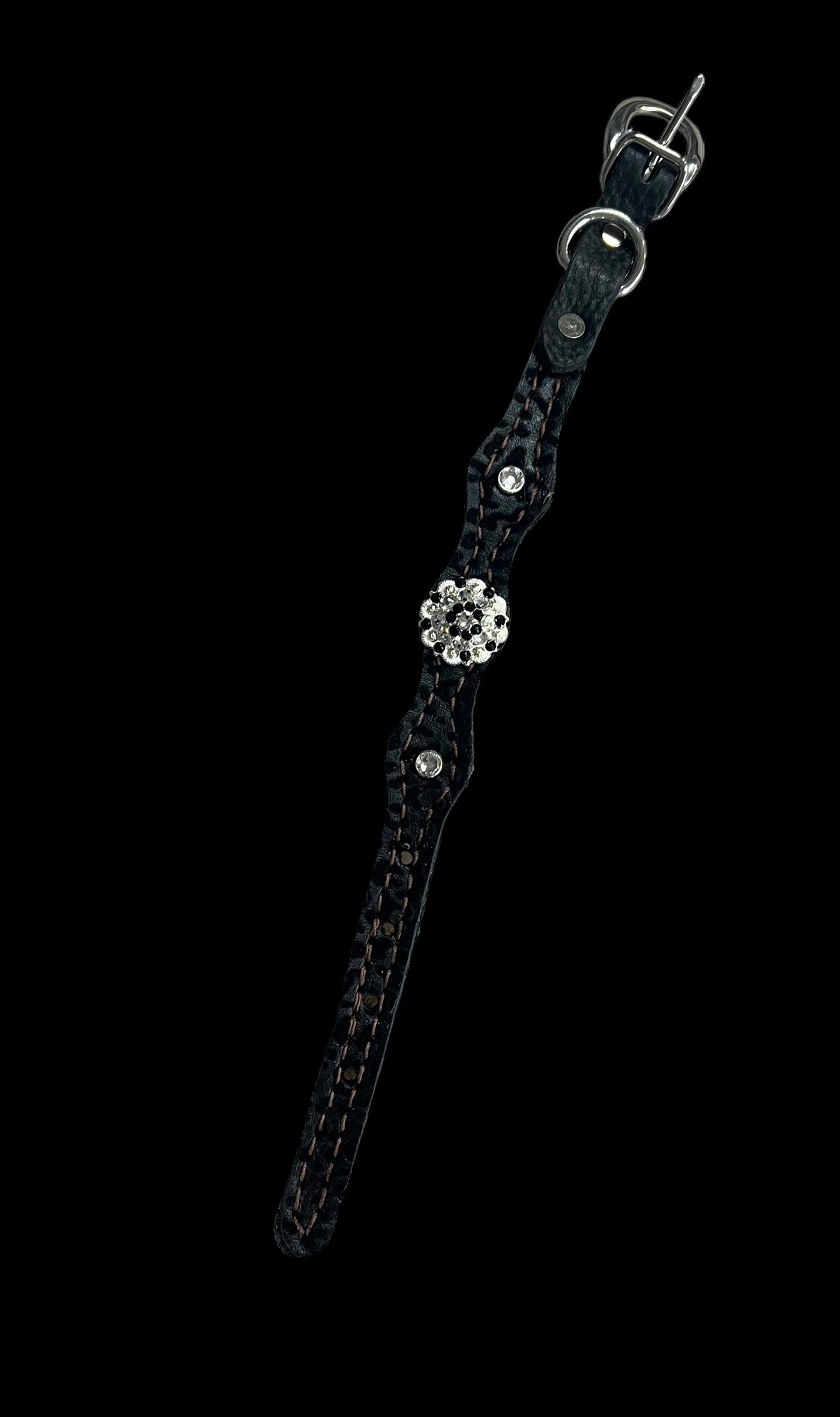 Black flocked leopard on dark leather