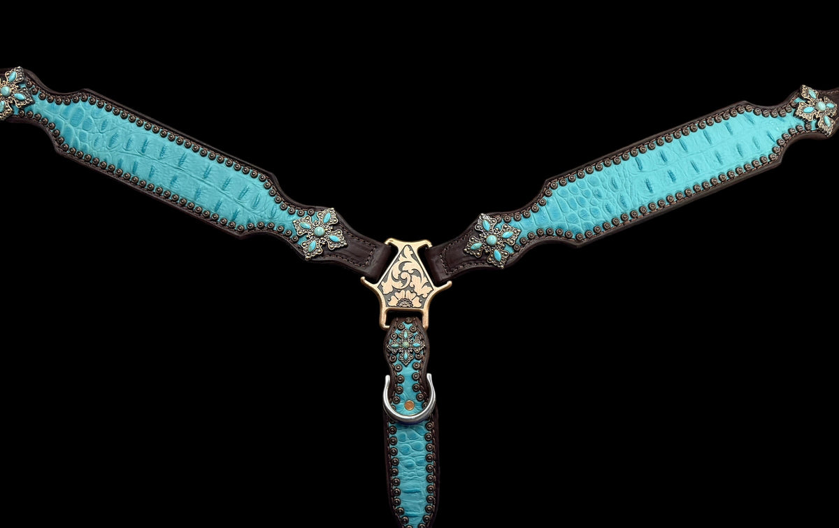 Turquoise gator on dark leather