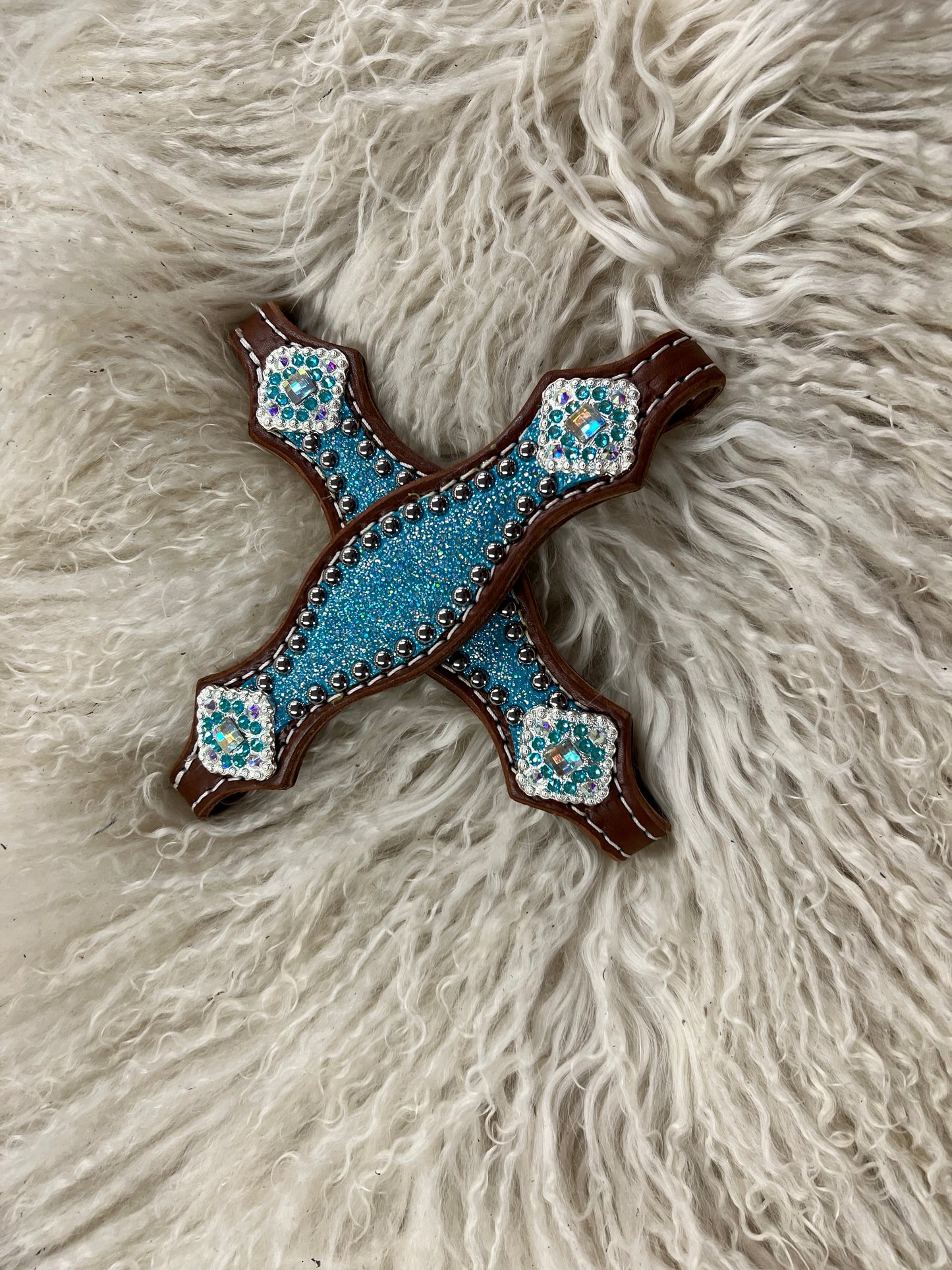 Turquoise sparkle on medium leather