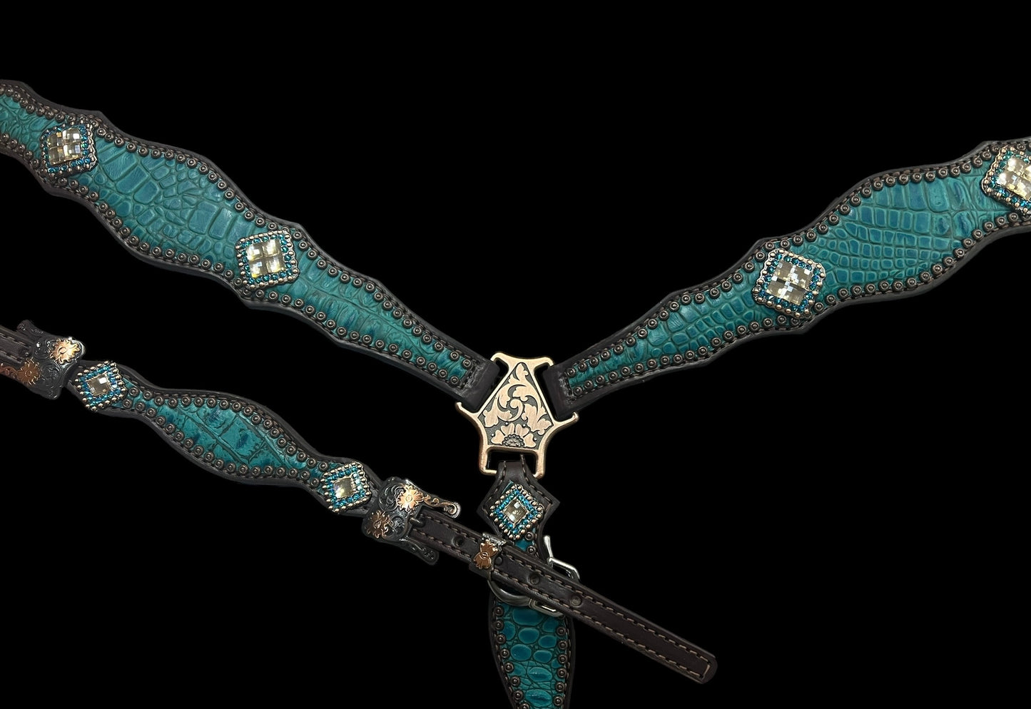 Teal gator on dark leather