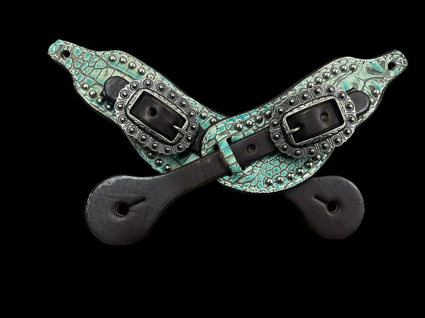 Antique turquoise gator on dark leather