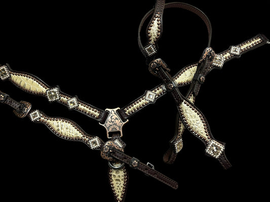 Champagne gator on dark leather