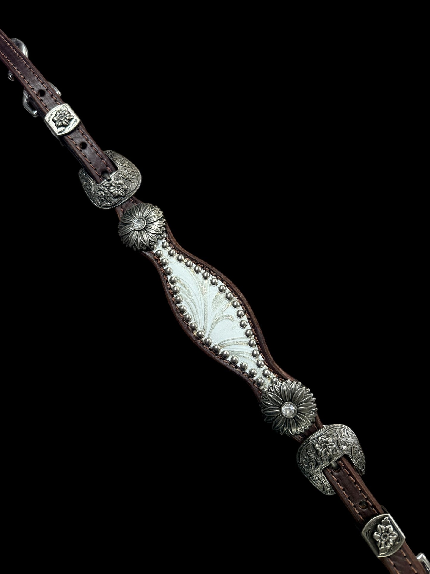 White and silver floral on dark leather