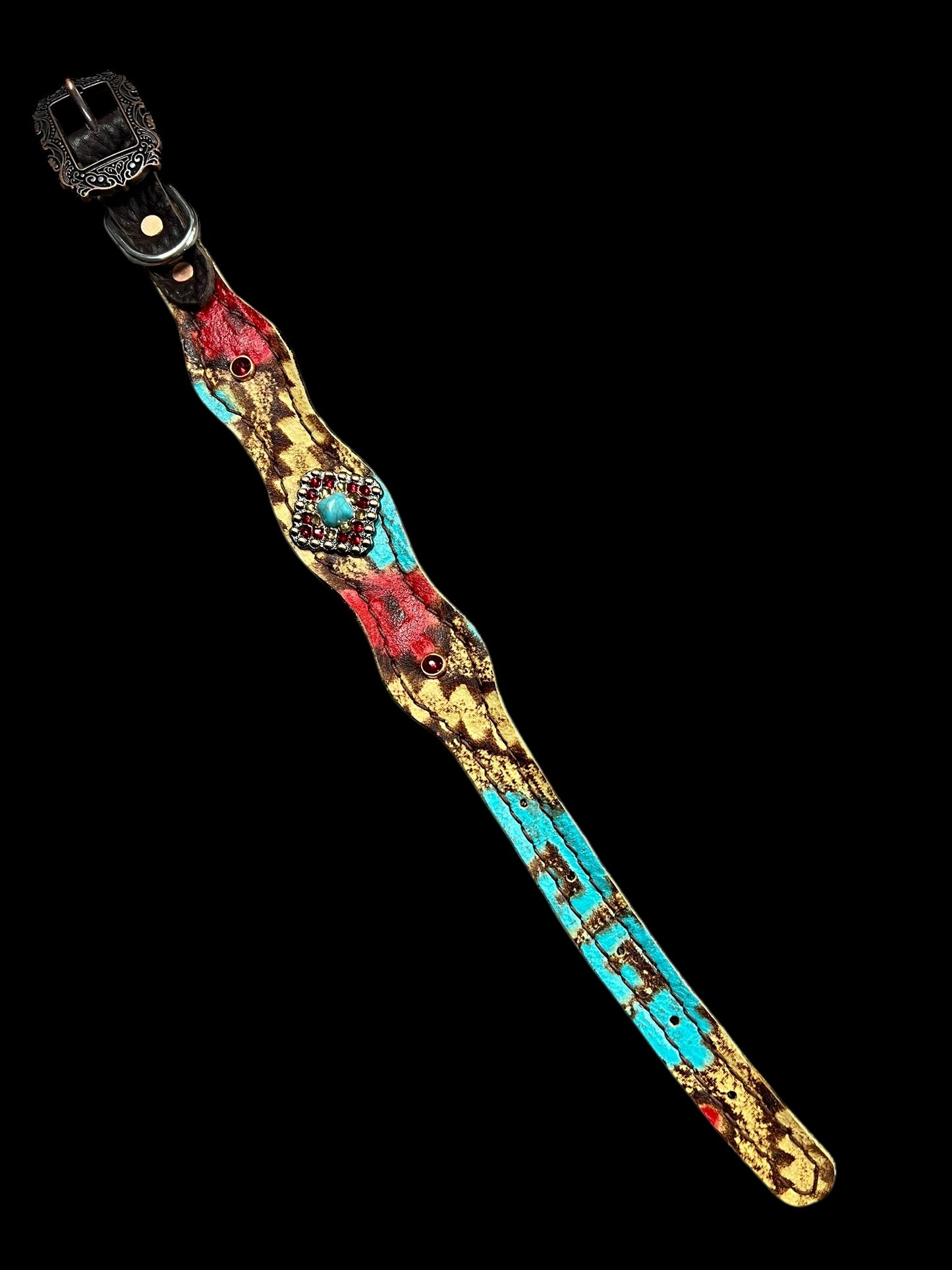 Tan, red, and turquoise Taos on dark leather