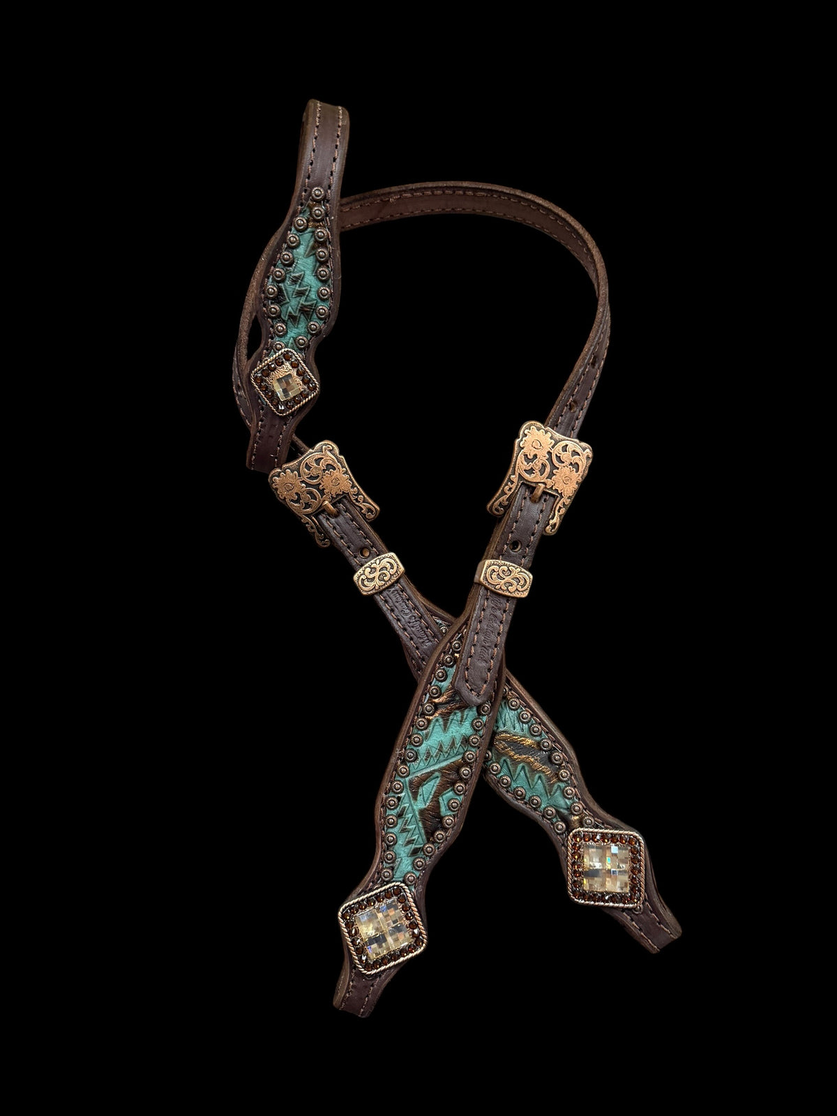 Teal and brown aztec on dark leather