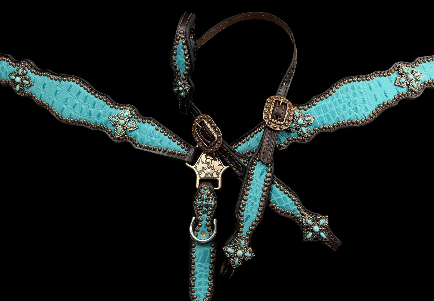 Turquoise gator on dark leather