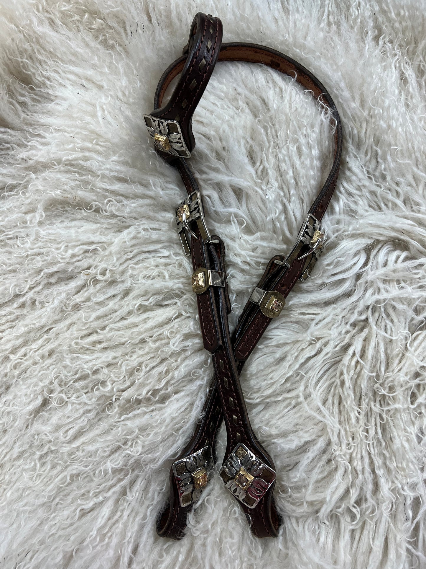 Buckstitched one ear headstall with premium conchos