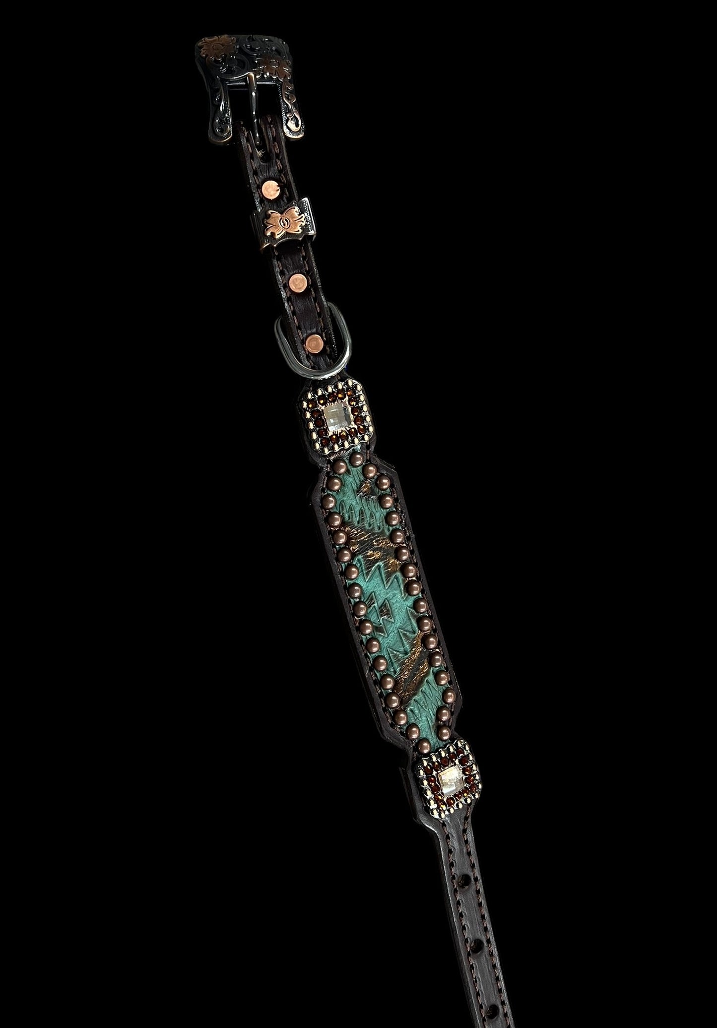 Teal and brown aztec on dark leather