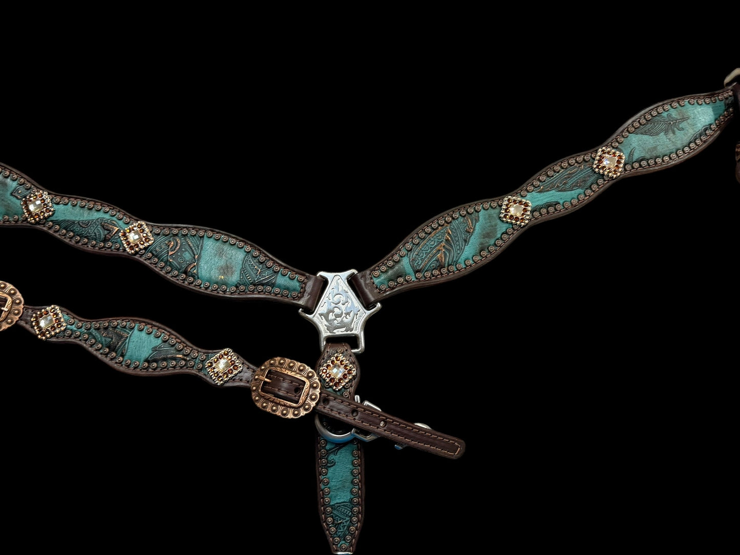 jade feathers on dark leather