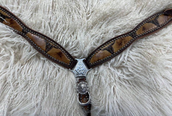 Large pony tan cow skulls on dark harness leather