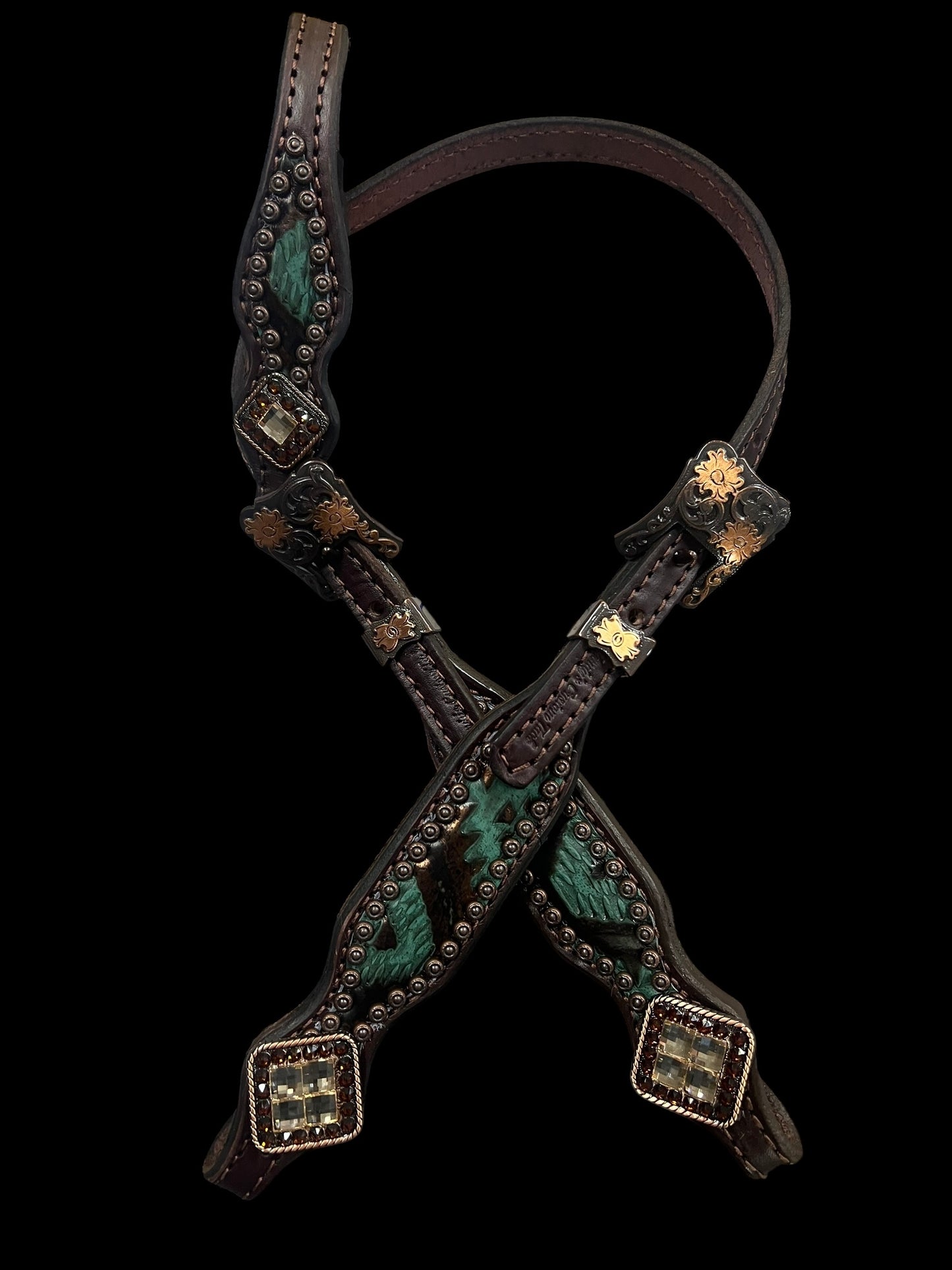 Teal and brown aztec on dark leather