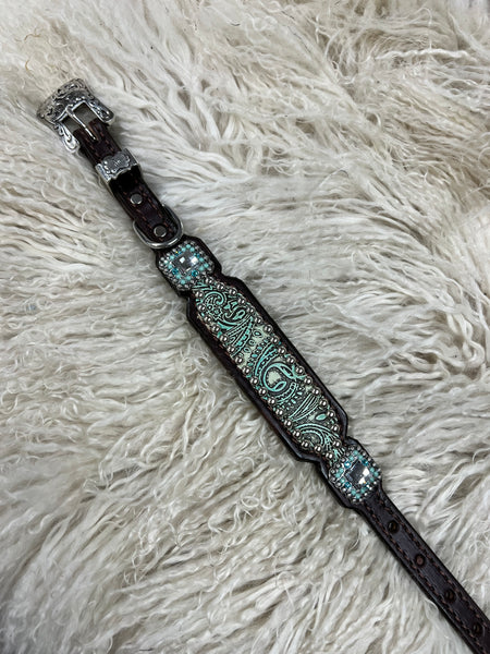 Turquoise and mint paisley on dark leather is
