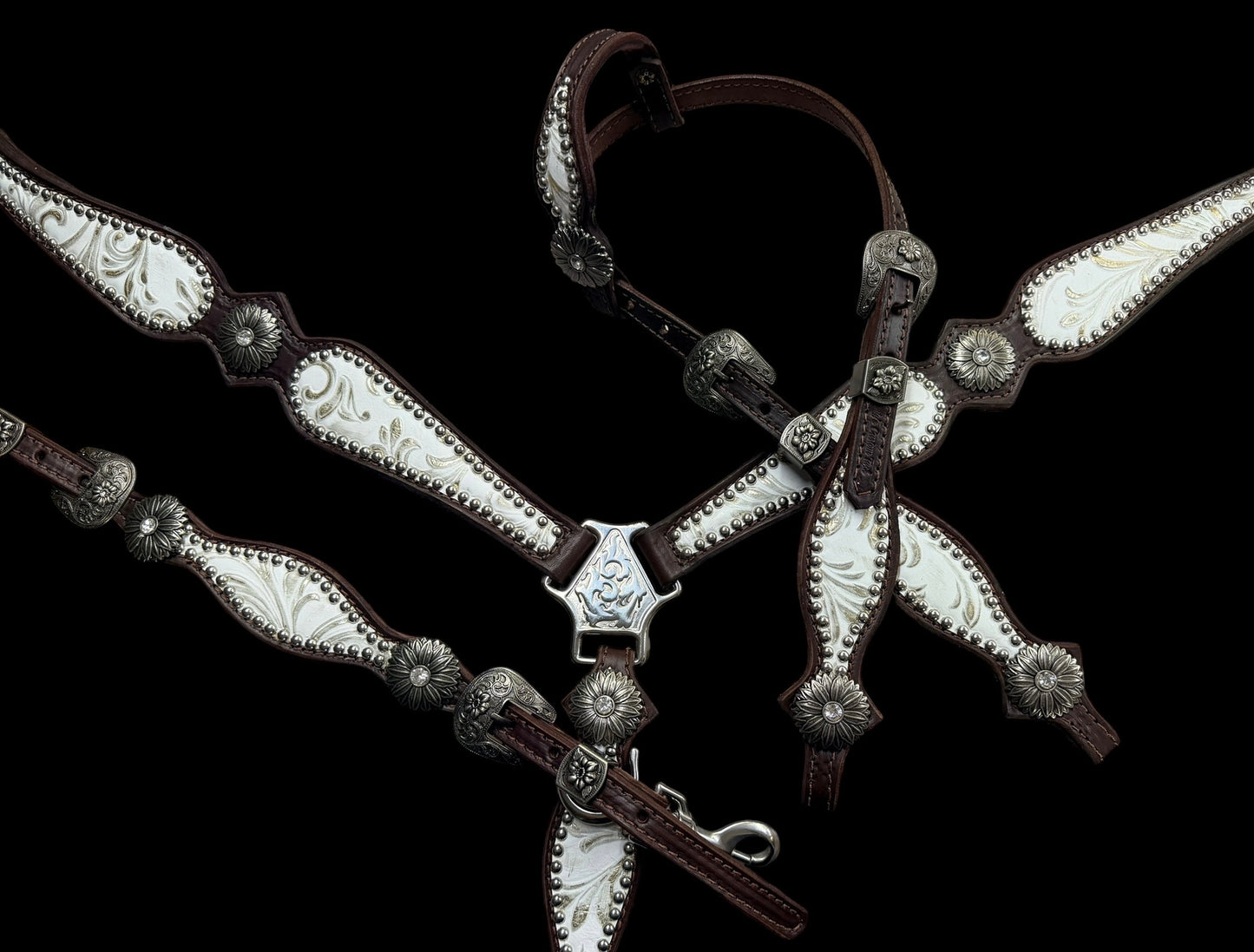 White and silver floral on dark leather