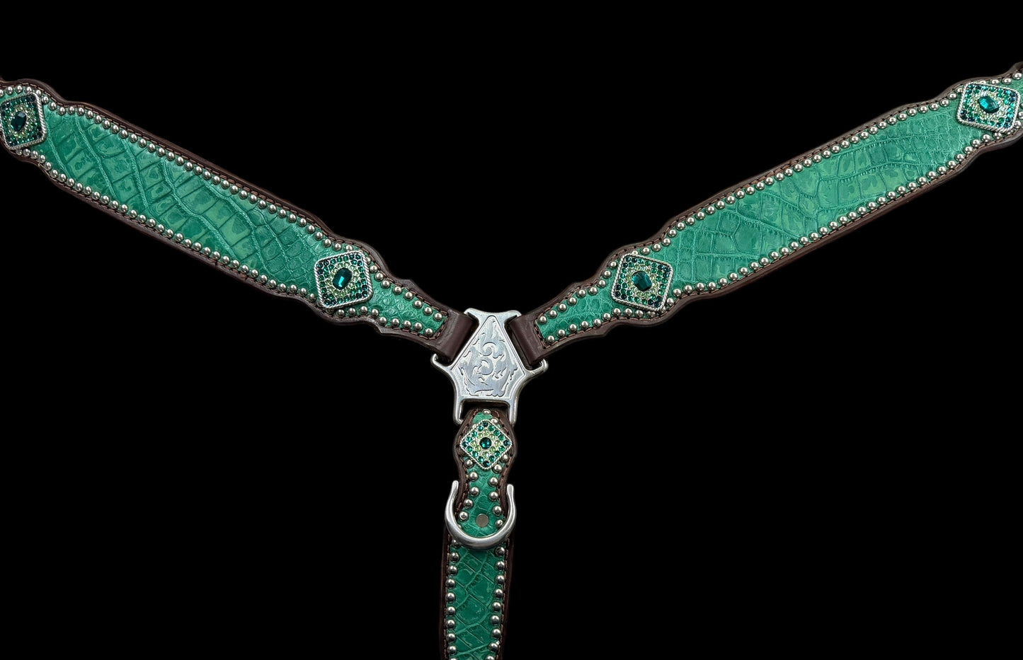 Genuine distressed green alligator on dark leather
