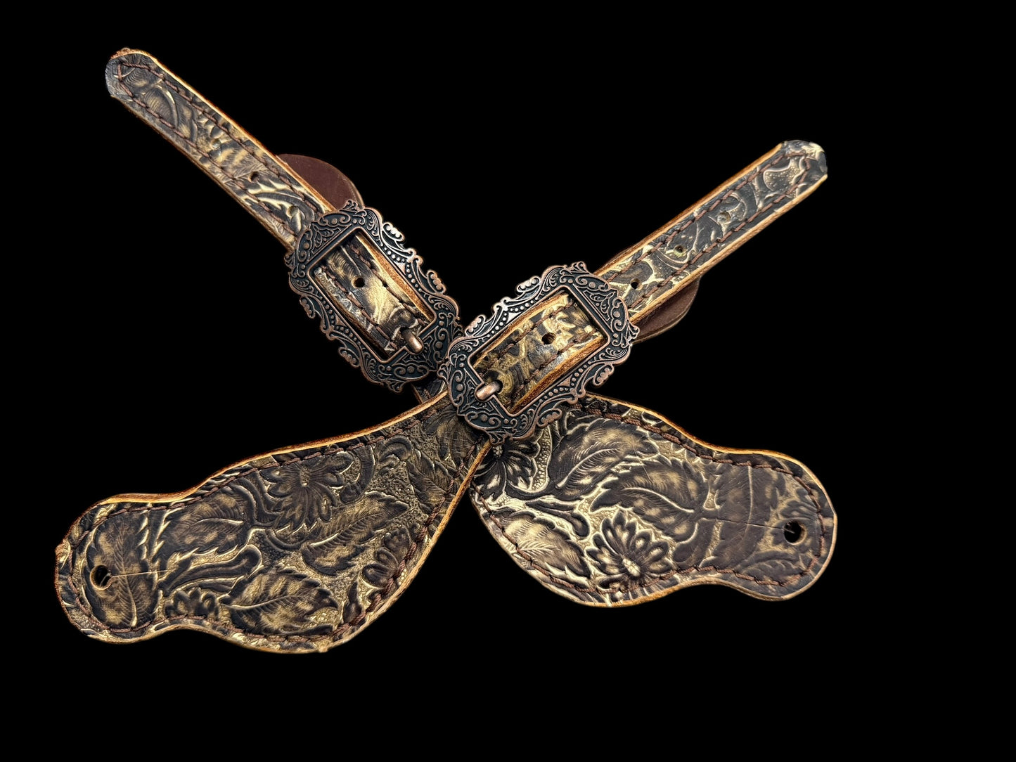 cream and brown daisy on dark leather