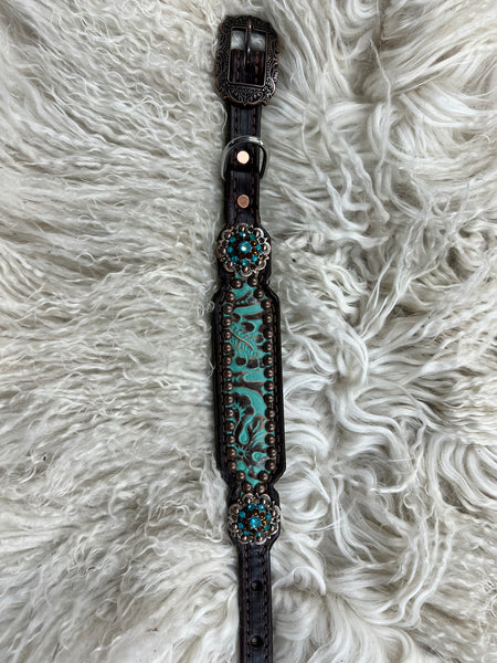 mint and brown floral on dark leather