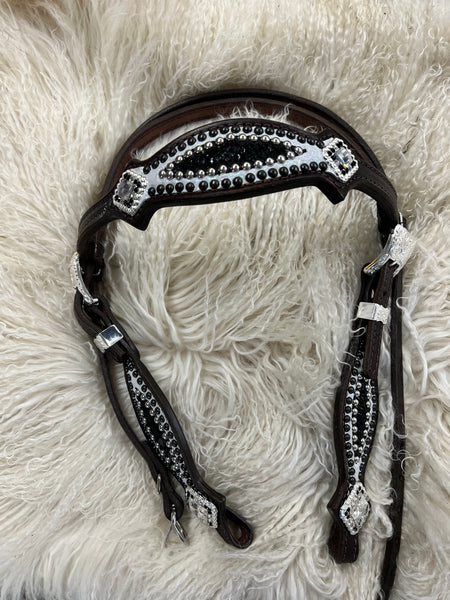 Black and white mystic on dark leather