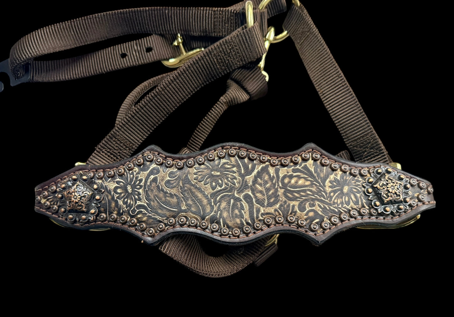 cream and brown daisy on dark leather