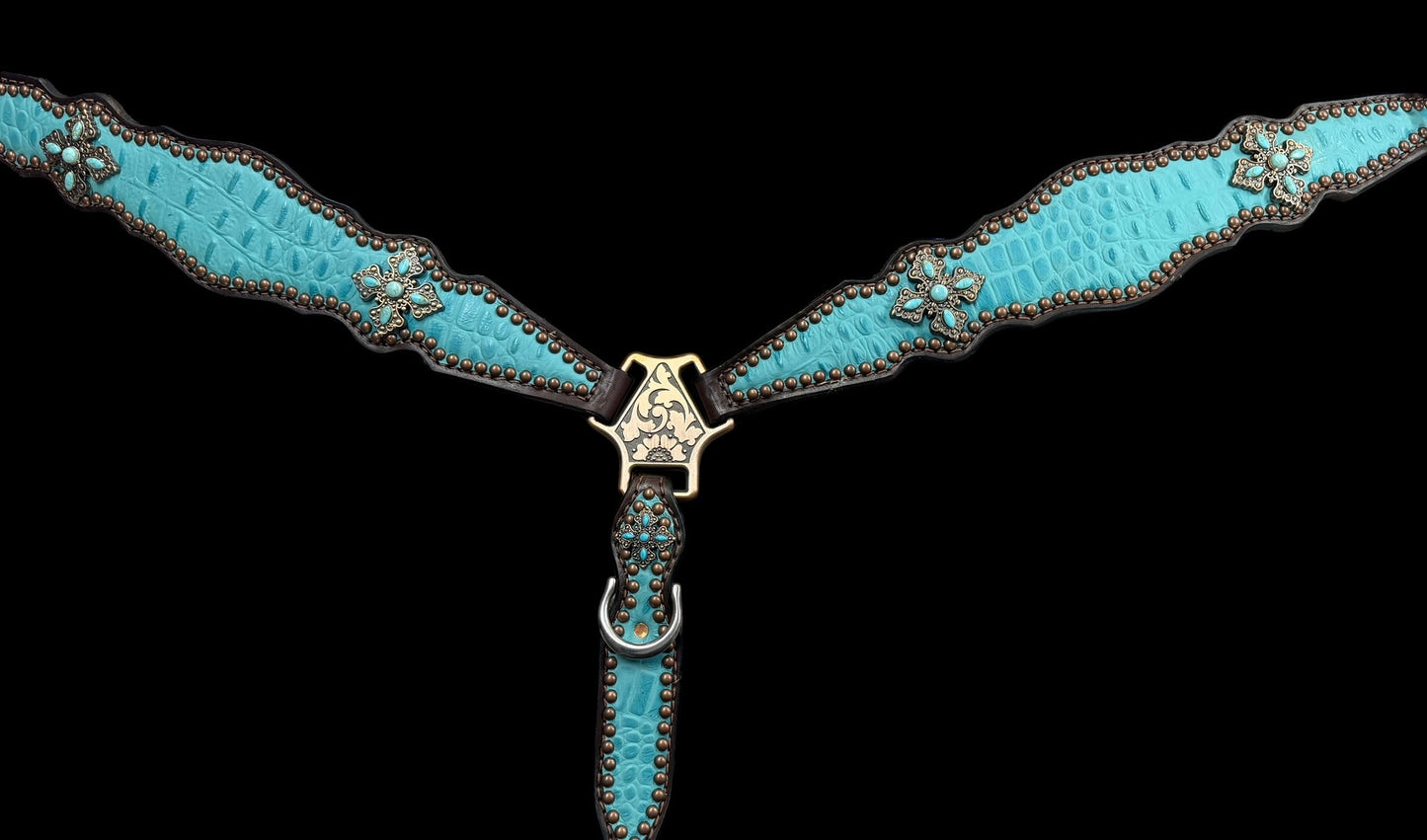 Turquoise gator on dark leather