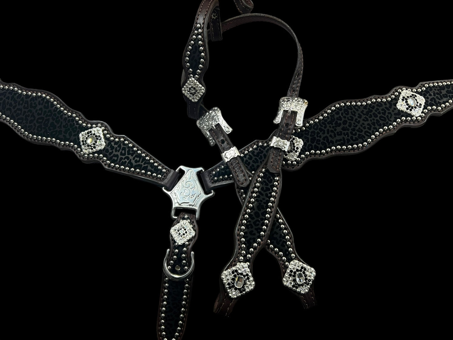 Black flocked leopard on dark leather