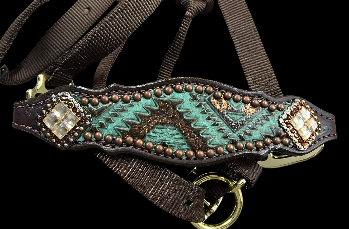 Teal and brown aztec on dark leather