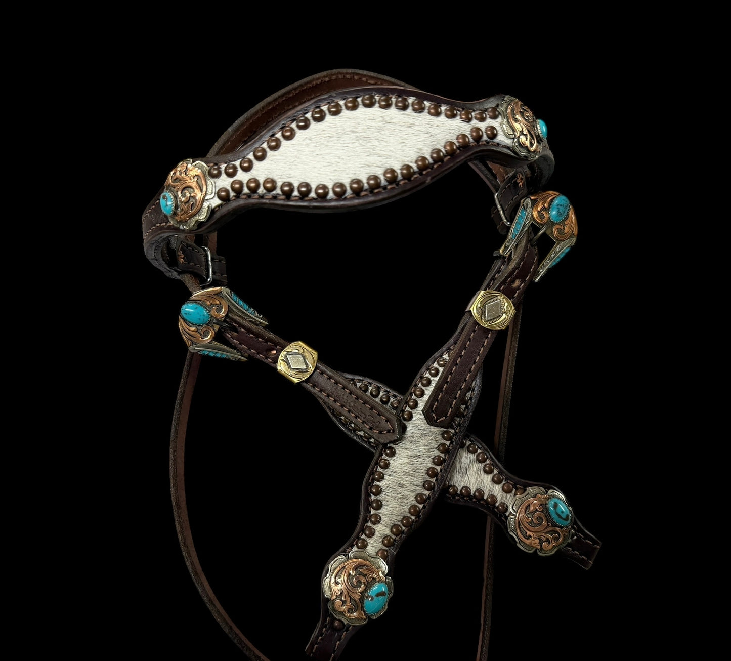 White and grey brindle  cowhide on dark leather