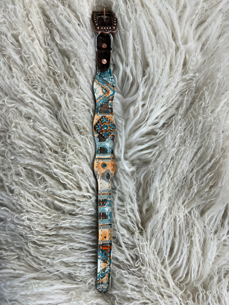 Orange and turquoise navajo on dark leather