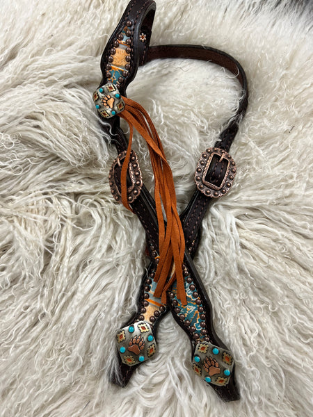 Orange and turquoise navajo on dark leather