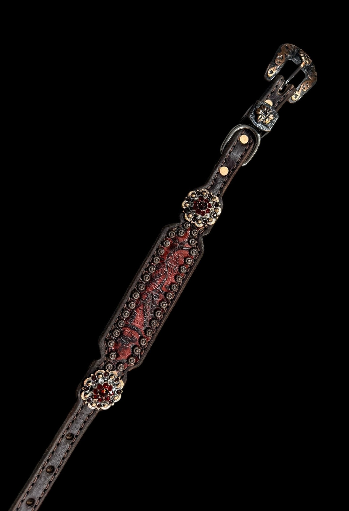 Red roses on dark leather