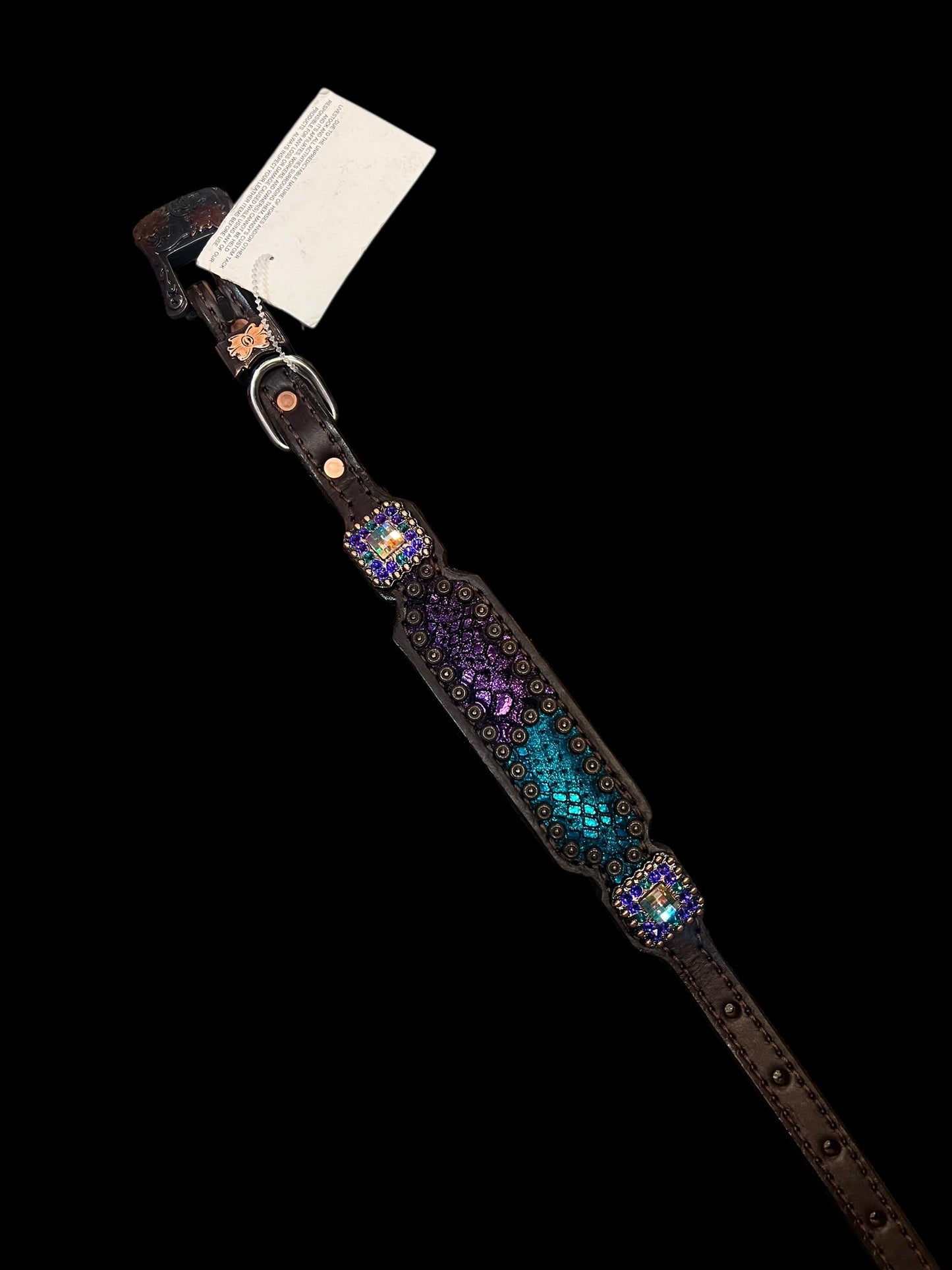 Teal and purple mystic on dark leather