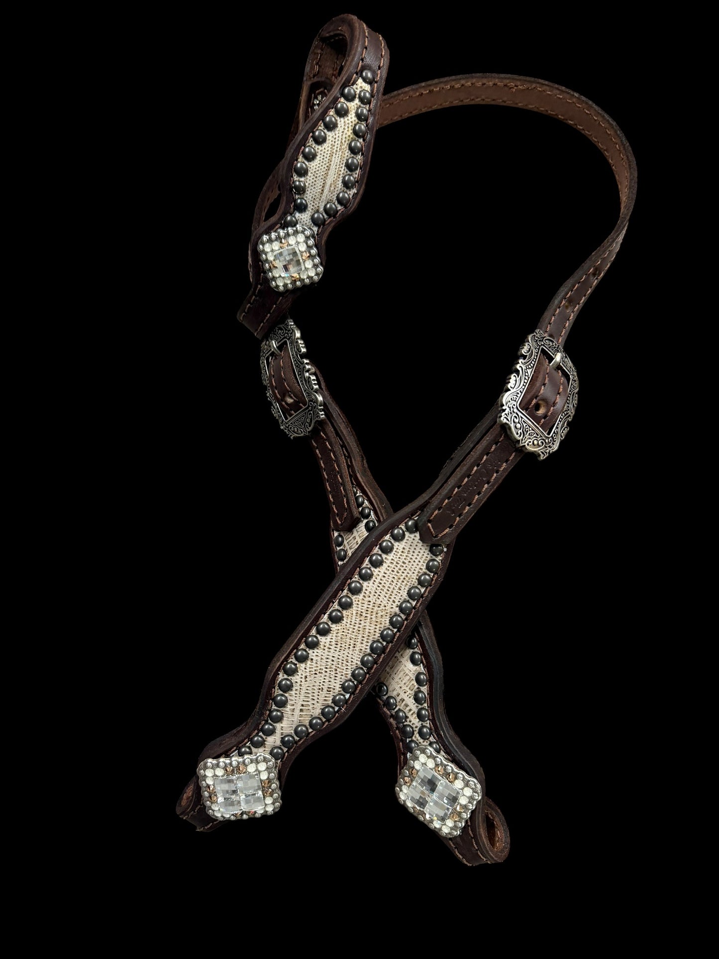 copper lizard on dark leather