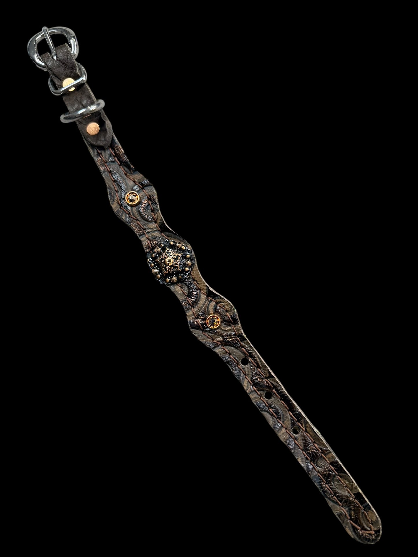 Brown swirl on dark leather