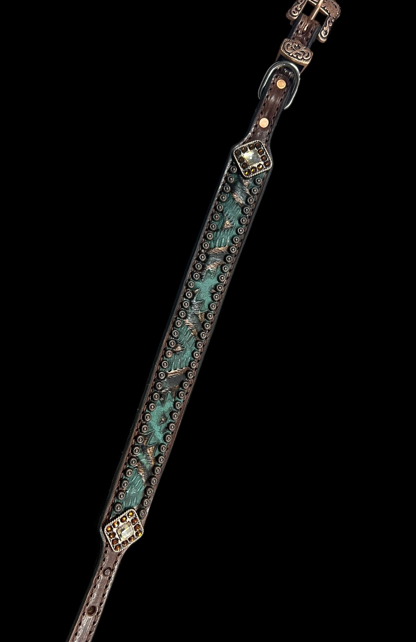 Teal and brown aztec on dark leather