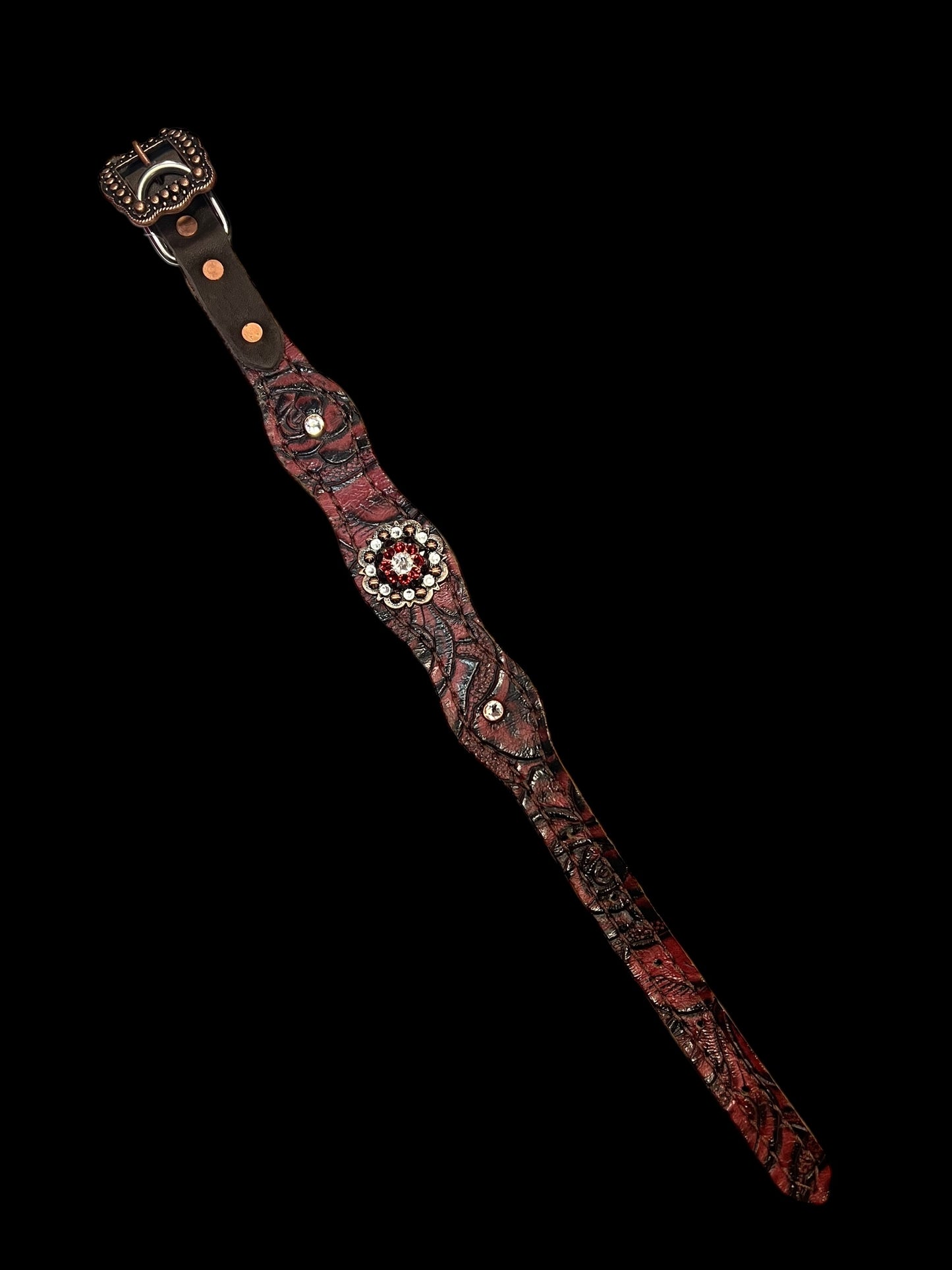 Red roses on dark leather