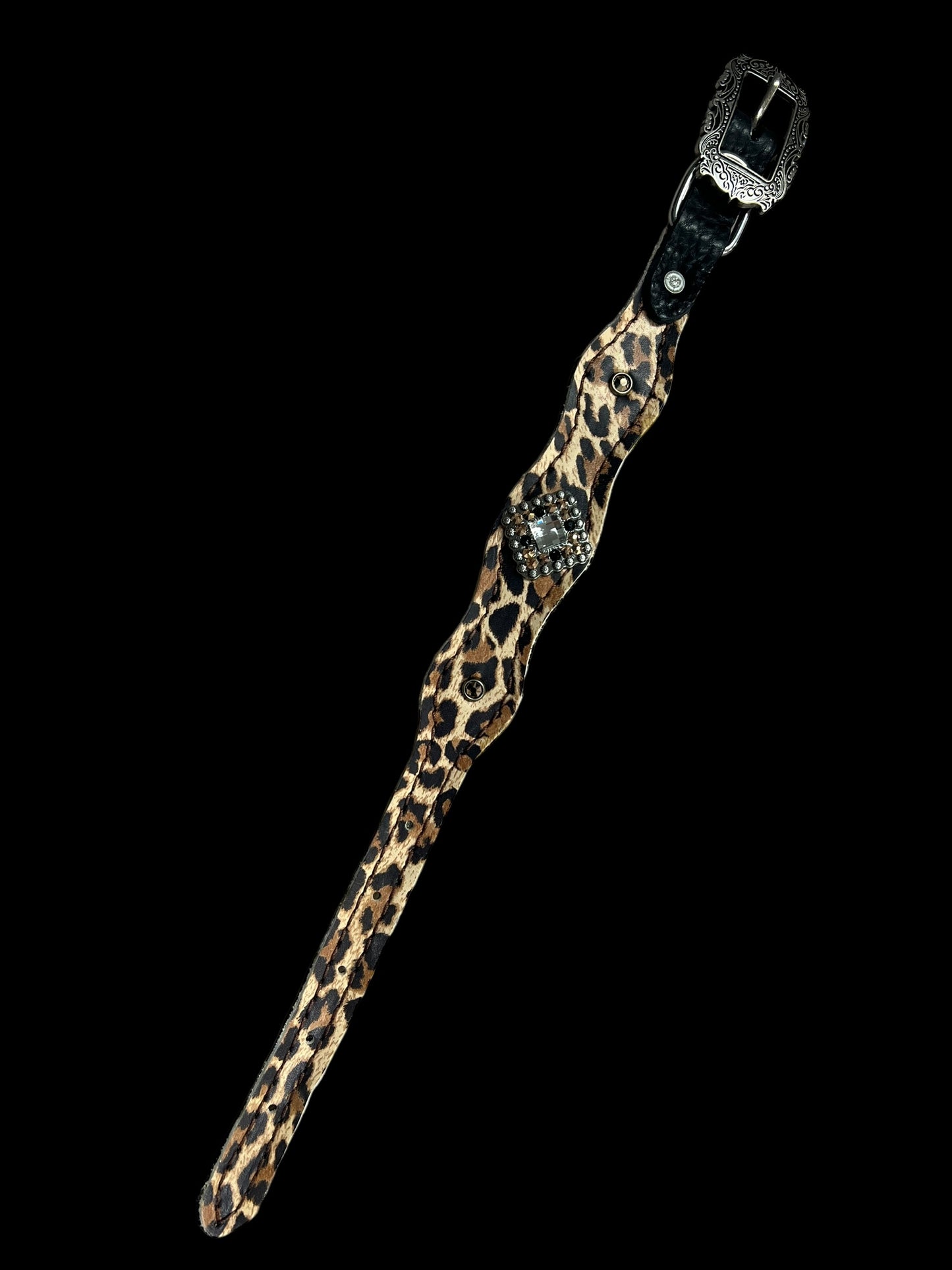 Leopard on dark leather