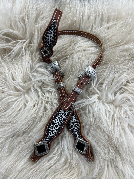 Flocked snow leopard on medium leather