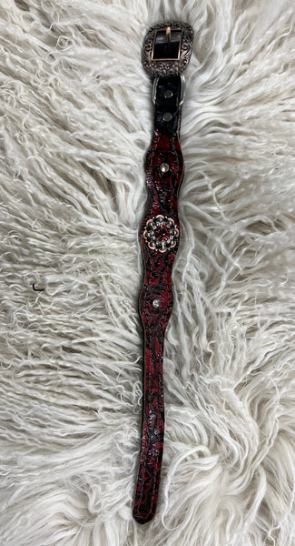 Red roses on dark leather