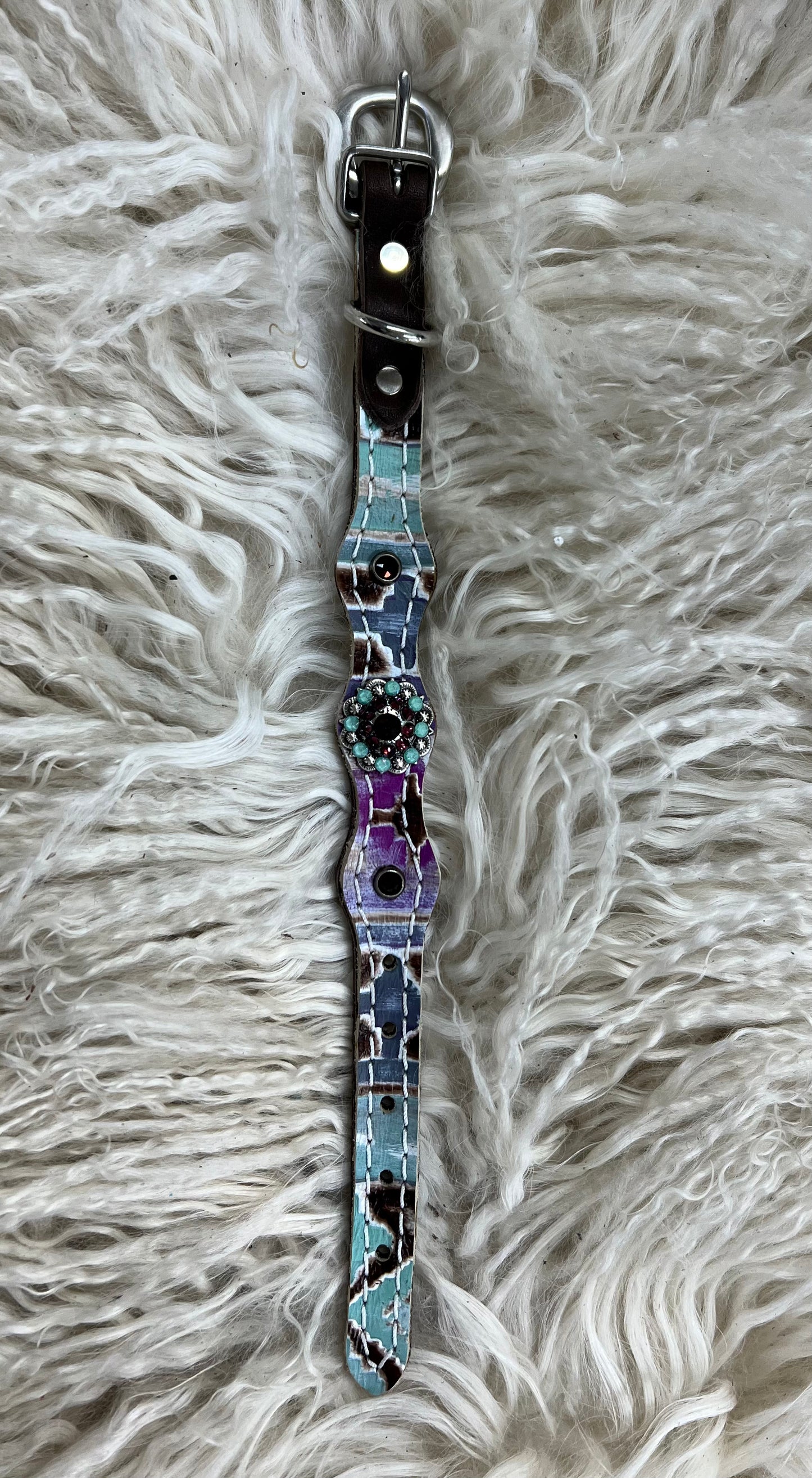 Mint and purple Navajo on dark leather