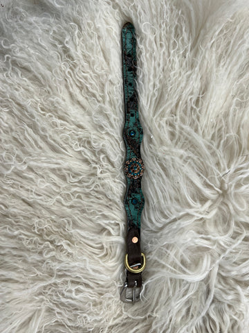 Teal and brown aztec on dark leather