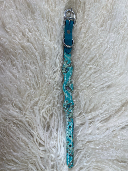 Turquoise Aztec on dark leather