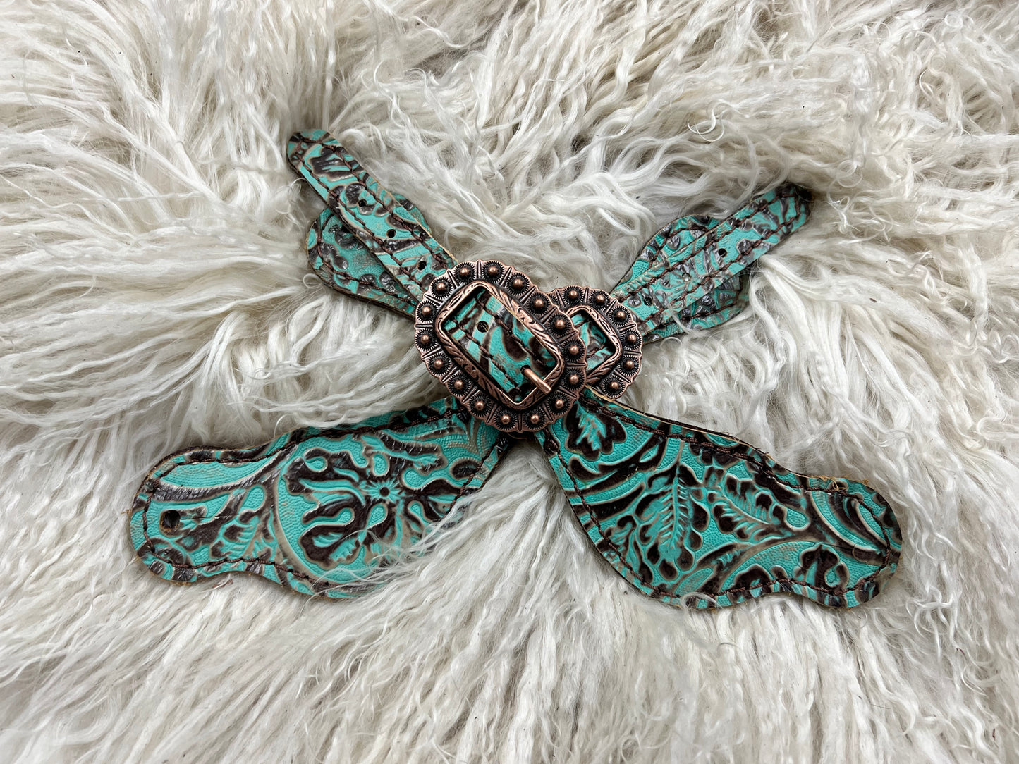 mint and brown floral on dark leather