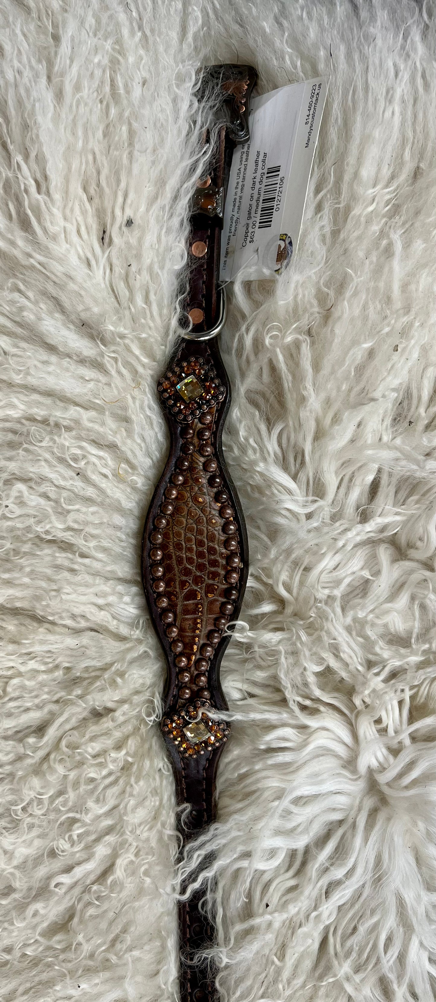 Copper gator on dark leather