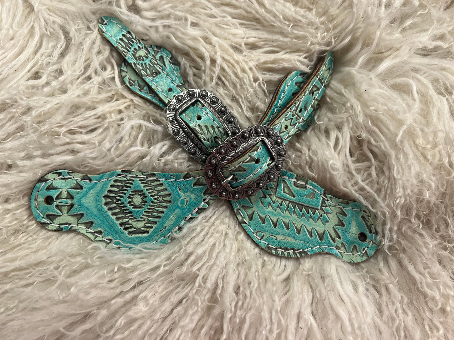 Turquoise Aztec on dark leather